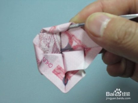 用钱折纸 如何用人民币折纸玫瑰花步骤图解