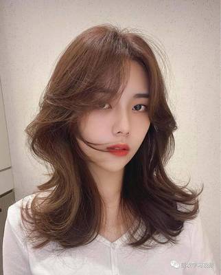 脸长剪什么发型好看女