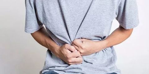腹部中间疼是怎么回事
